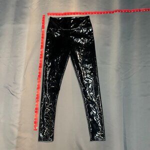 Black shiny/glossy Leggings.  Size Medium (per label). Like New w/o tags.